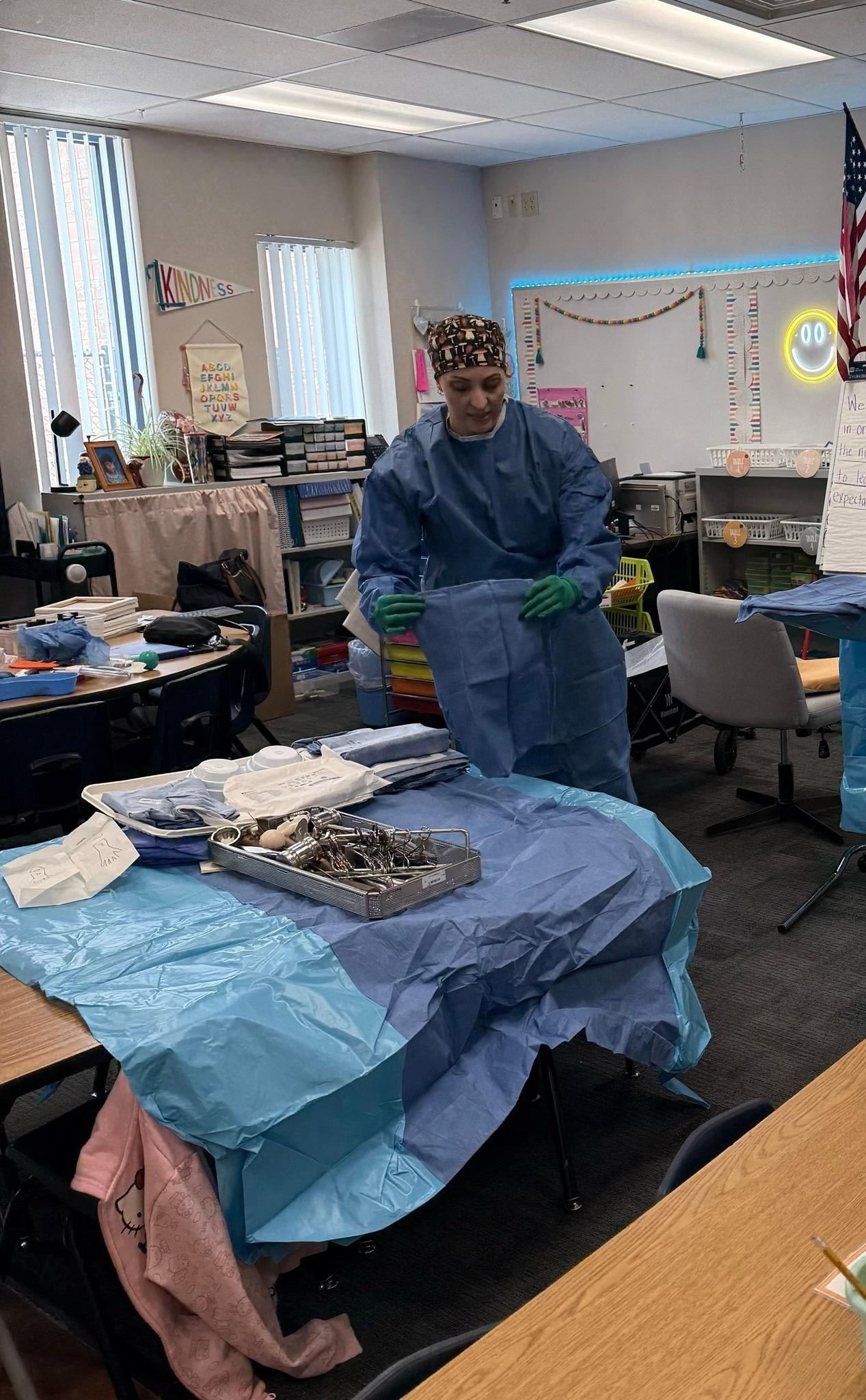 Alyssa Ellis demonstrating surgical preparation in a classroom setting